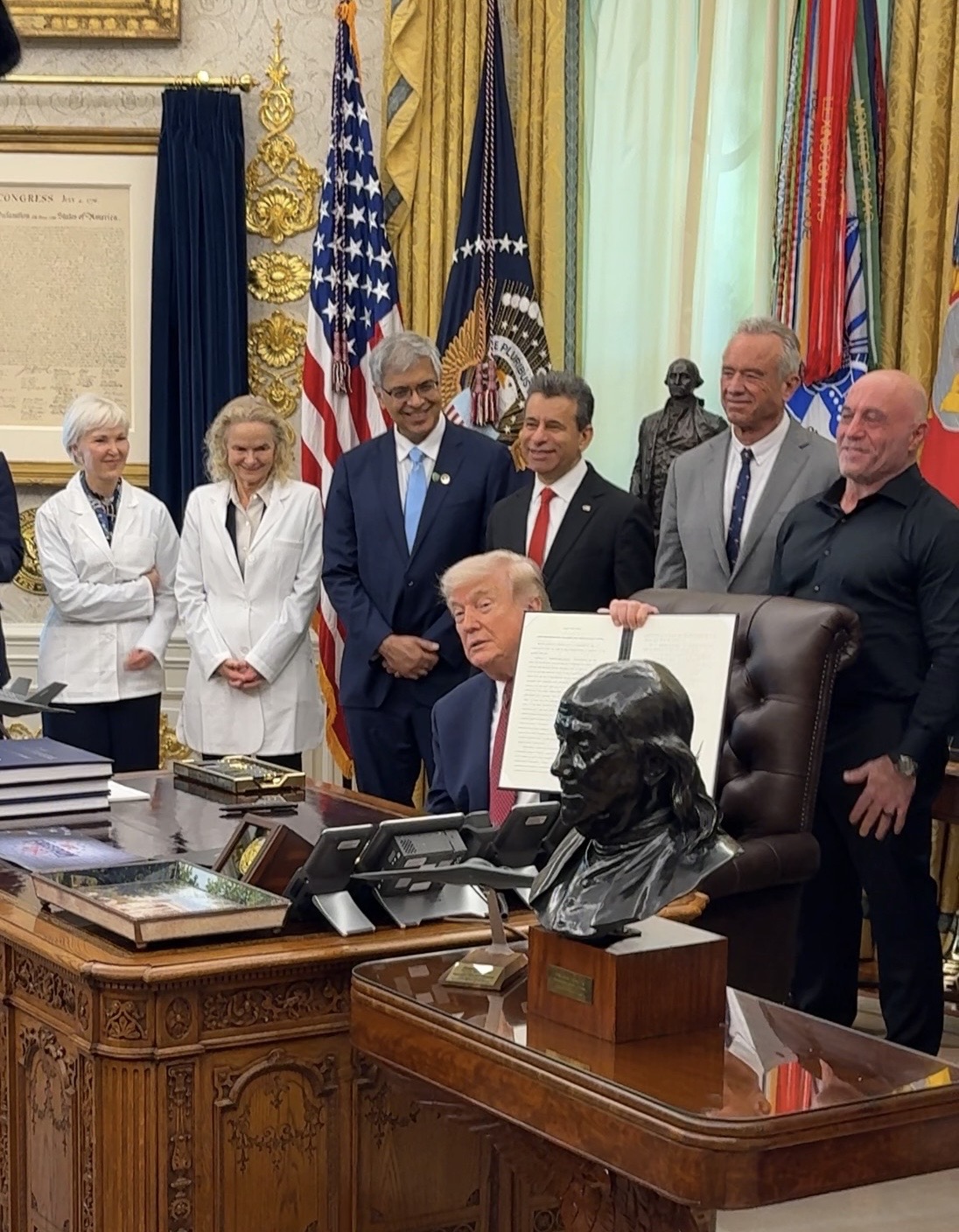 President signing the Executive Order on psychedelic and ibogaine research in the Oval Office